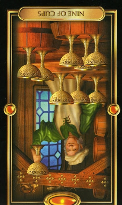 reversed nine of cups gilded tarot