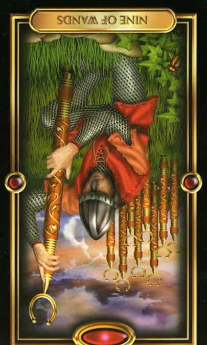 reversed nine of wands gilded tarot
