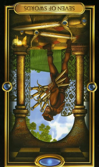 reversed seven of swords gilded tarot